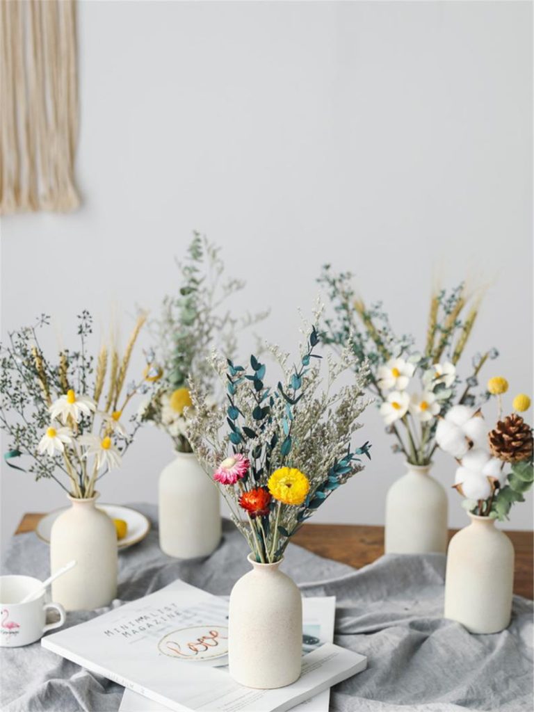 Dried flowers in white vases
