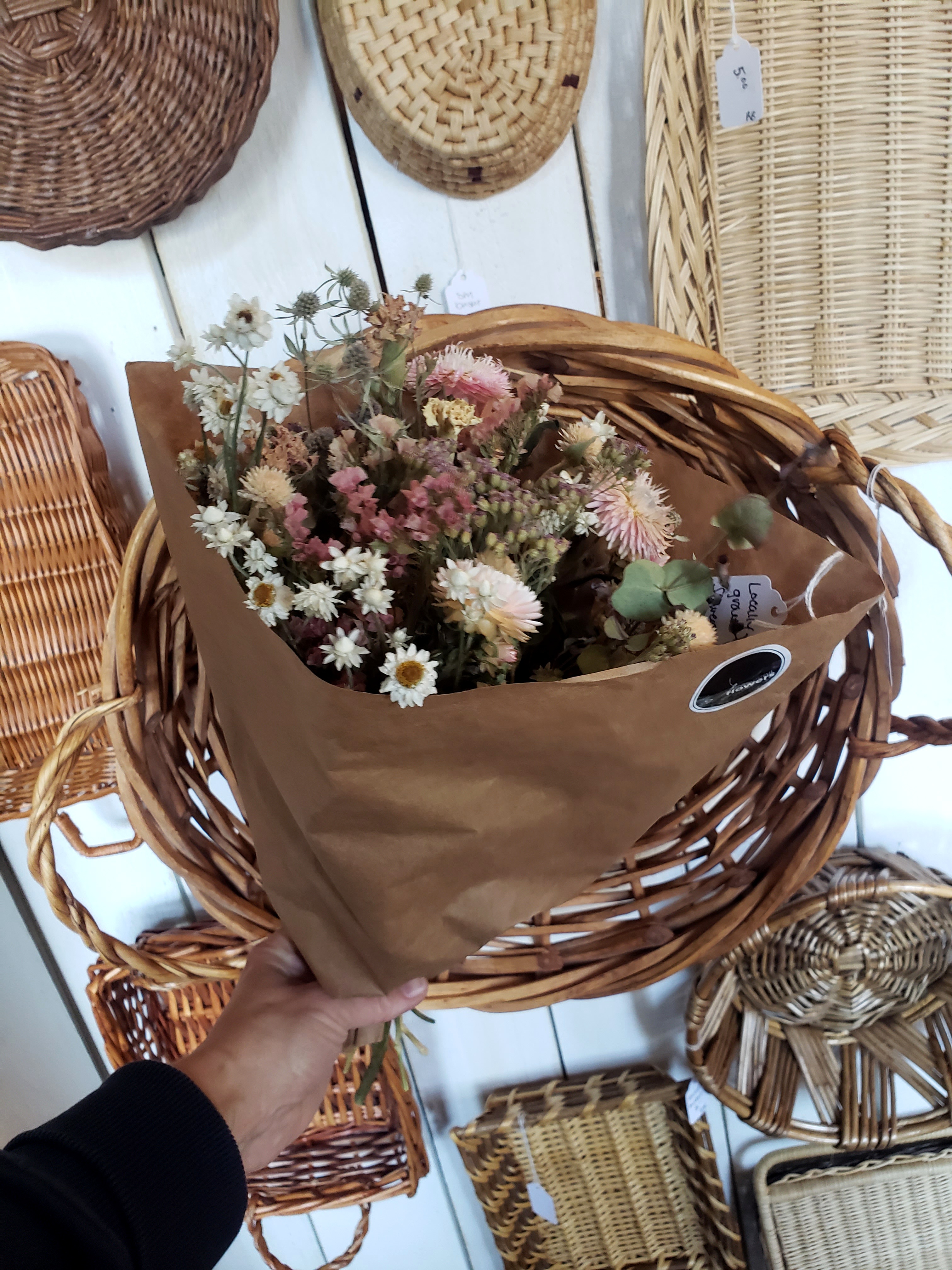 Holding a dried flower bouquet