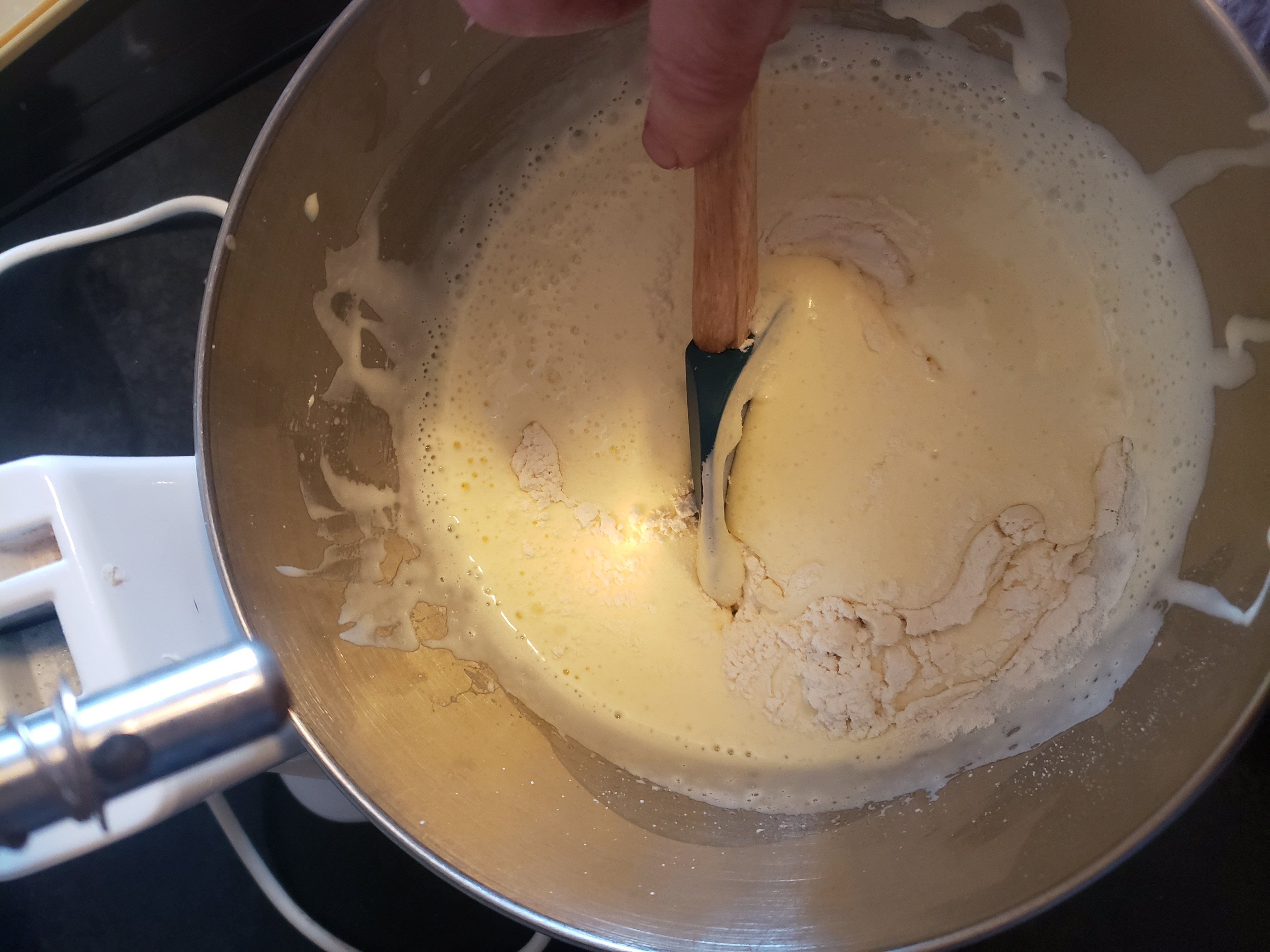 folding flour into whipped mixture