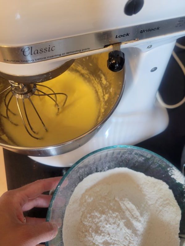 Mixing bowl with wet ingredients and bowl with dry ingredients.