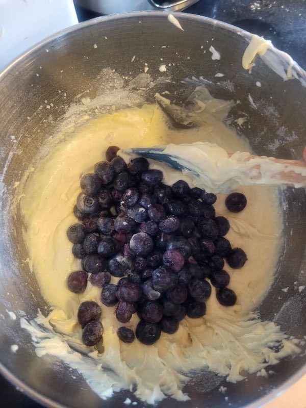 Blueberries in a cake batter.