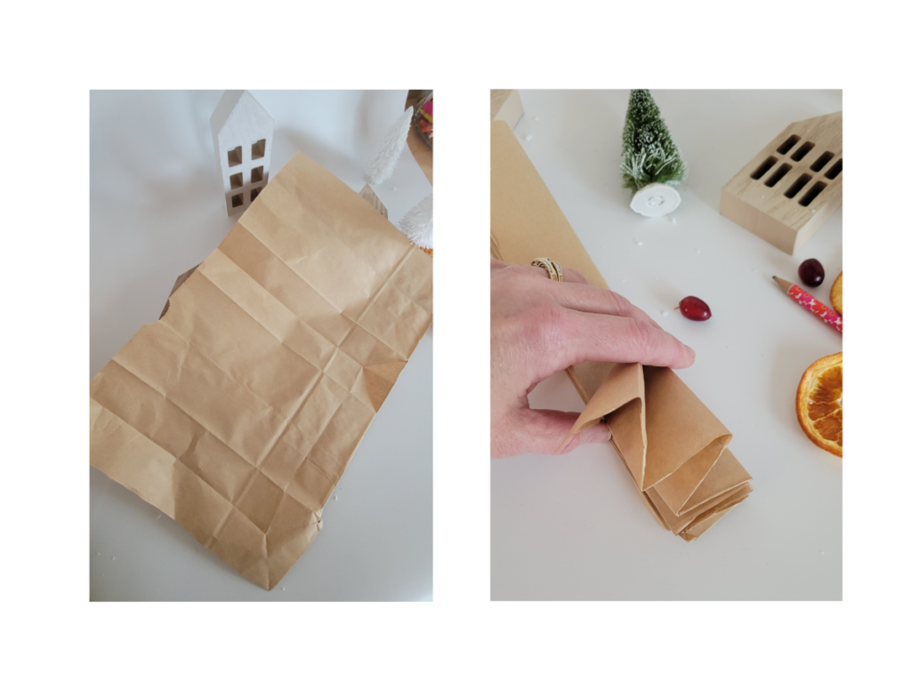 Folding a brown paper bag for a tree.